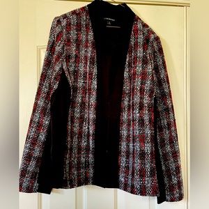 Ladies dressy blazer. Professional appearance 25” armpit to armpit. 27” length.